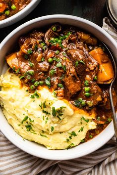 two bowls filled with meat and mashed potatoes