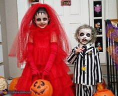 two children dressed up in halloween costumes