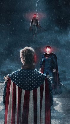 two people standing in the rain with an american flag draped over them, and one person wearing a cape