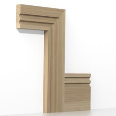 three wooden frames on a white wall with one leaning against the wall and another standing up