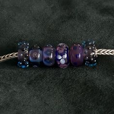 Sterling Silver Trollbeads Bracelet With Authentic Trollbeads. Beautiful Glass Beads In Shades Of Purple And Blue. Trollbeads Bangle, Trollbeads Bracelet, Shades Of Purple, Womens Jewelry Bracelets, Blue Purple, Blue And Purple, Glass Beads, Bangles, Size 7