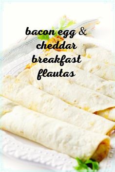 bacon egg and cheddar breakfast burritos on a white plate with text overlay