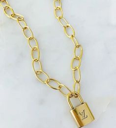 Vintage LV Lock Necklace – lojobands.com Book Locket Necklace, Silver Wrap Ring, Spike Necklace, Heart Engagement Rings, Simple Stud Earrings, Lock Necklace, Tiny Studs, Tiny Diamond, Tiny Stud Earrings