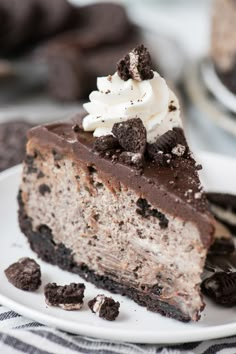 a piece of chocolate oreo cheesecake on a plate