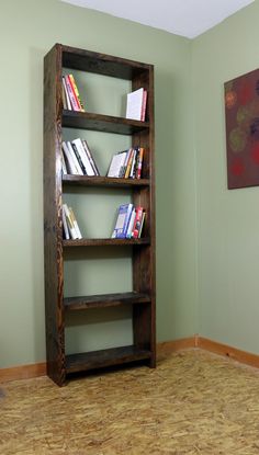 a bookshelf sitting in the corner of a room