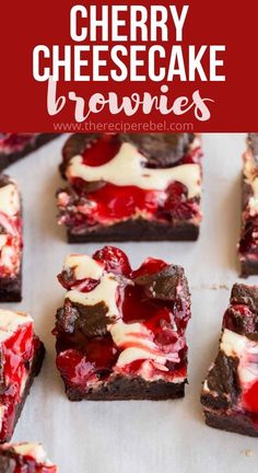 cherry cheesecake brownies with white chocolate and cherries on top are shown in the foreground