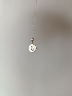 "This sterling silver pendant with a crescent moon is a handmade piece and  unique.  Each moon has its own special shape, so there are no two alike. If you prefer a specific position for the moon, please write to me. Additionally, the silver chain is adjustable, allowing you to wear it at your preferred length, between 40 and 45 cm. It's the perfect accessory to add a special touch to your unique style. To make this pendant, we use the highest quality silver sourced ethically from European mines Waning Gibbous Moon, Gibbous Moon, Waxing Moon, Moon Designs, Moon Moon, Crescent Moon Pendant, Moon Design, Small Pendant, Write To Me