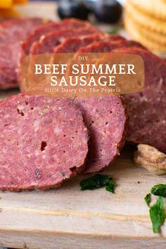 sliced sausages on a cutting board with the words diy beef summer sausage