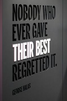 there is a sign on the wall that says nobody who ever gave their best regted it