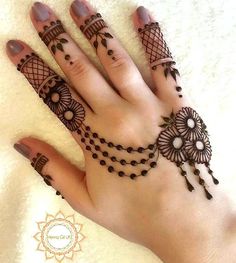 hendi tattoos on the palm of a woman's hand