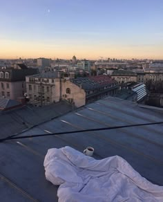 a view of the city from an apartment roof