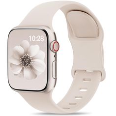 an apple watch with a flower on the front and side of it's face