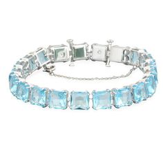 Swarovski Ladies Bracelets. Millenia series. SKU: 5614924. Barcode: 9009656149249. Color: Blue. Swarovski Ladies Millenia Rhodium Plated Square Cut Bracelet. This bracelet is part of the Millenia family, designed by Creative Director Giovanna Engelbert for Collection II. With a concealed fastening and sleek, rhodium-plated frame, it allows the vibrant, aquamarine, square-cut crystals to steal the spotlight. Minimum length: 17 cm. Maximum length: 19 cm. Size: one size.  Gender: female.  Age Group: adult. Summer Jewelry Trends, Steal The Spotlight, Fine Pens, Girly Accessories, Fragrance Gift Set, Swarovski Jewelry, Square Cut, Summer Jewelry, Link Necklace