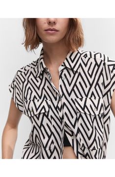 An inky geo print emboldens this blousy shirt designed in a sleeveless silhouette. Spread collar Sleeveless 100% viscose Machine wash, line dry Imported Tropical Print Shirt, Flowy Shirt, Geo Print, Tropical Print, Latest Fashion Trends, Black Shirt, Printed Shirts, Shirt Style, Shirt Blouses