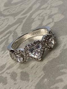 Beautiful! Sterling Silver 925, Heart Simulated Diamond / Cz Multi Stone Ring  Size- 6 Measures- 8mm wide  Weight: 3.5 grams  Stamped: 925  Condition : very good condition  Thank you for Visiting! Silver Heart Ring With Halo Setting For Formal Occasions, Silver Cubic Zirconia Heart Ring With Prong Setting, Silver Cubic Zirconia Heart Ring With Round Cut, Silver Heart Ring With Brilliant Cut Cubic Zirconia, Classic Silver Heart Ring With Cubic Zirconia, Silver Heart Ring With Diamond Accents And Cubic Zirconia, Silver Heart Ring With Halo Setting And Round Cut, Silver Heart Cut Ring For Formal Occasions, Classic Silver Heart Ring With Halo Setting