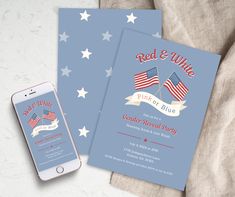 an iphone next to a red and white flag themed wedding card on a blue background