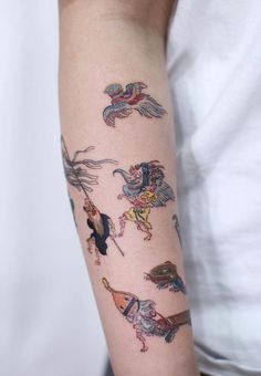 a person with a tattoo on their arm