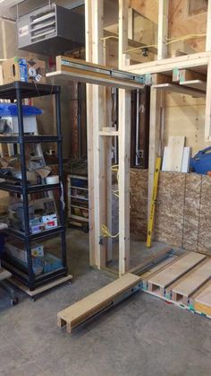 the inside of a building being built with wood and plywood boards on the floor