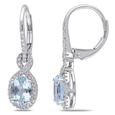 These glistening earrings from the Miadora Collection each feature an oval-cut aquamarine adorned with brilliant round white diamonds. This classic pair is set in 10-karat white gold and are secured with leverbacks. Style: Dangle Gemstone colors: Blue-green Gemstone shapes: Oval Two prong-set oval-cut aquamarine each m Infinity Earrings, Aquamarine Earrings, March Birthstone, Gold Halo, Aquamarine Stone, Leverback Earrings, White Gold Earrings, Diamond Drops, Diamond Drop Earrings