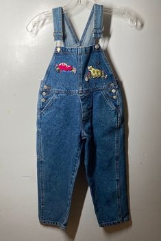 "Purchase patches professionally done just like that years ago / No issues / smoke free home / made in Hong Kong / labeled sz 6 measures waist 13\" / inseam 16 1/2\" / length (shoulder straps fully extended to bottom leg) 36\" / No issues good condition (88)" Retro Denim Bib Front Jumpsuit, Retro Denim Jumpsuit With Bib Front, Vintage Denim Shortalls, Vintage Denim Overalls In Medium Wash, Vintage Medium Wash Denim Overalls, Vintage Denim Shortalls With Bib Front, Retro Bib Front Overalls In Medium Wash, Vintage Denim Bib Front Shortalls, Vintage Bib Front Denim Jumpsuit In Medium Wash