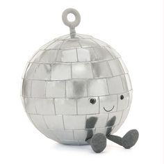 a silver disco ball ornament with a smiley face