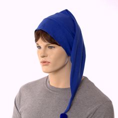 Royal blue nightcap made of cotton. Fabric is 96% cotton. Traditional Poor Poet style with pointed tip. Small blue pompom on end. Double thick headband. One size fits most adults with heads measuring 22-24 inches. Ready to Ship. Cotton Bonnet Cap, Adjustable Blue Bonnet Cap, Adjustable Blue Bonnet, Navy Cotton Winter Hat, Winter Navy Cotton Hat, Blue Hat With Cotton Sweatband, Blue Hat With Cotton Sweatband, One Size Fits Most, Thick Headband, Sleeping Hat