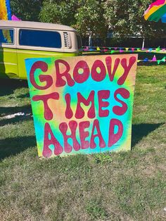 there is a sign that says grooy time's ahead on the grass