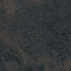 a close up view of a black granite surface