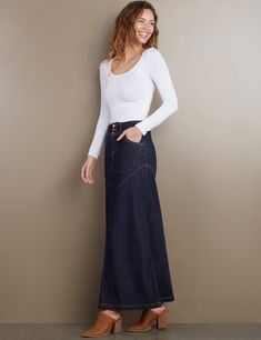 Details of old, made new. Beautiful waist/button detail, with pieced Premium denim construction, the Pieced Denim Maxi Skirt from Wash Lab is a must-own classic. The cover model is 5'9" wearing a size 26 Fabric: 95% Cotton 4% Polyester 1% Spandex Length: 39.25" from waist Below The Knee Skirt, Denim Corset Top, Sleeveless Denim Dress, Monochromatic Outfit, Denim Corset, Denim Overall Dress, Knee Skirts, Denim Maxi, Cropped Flare Jeans