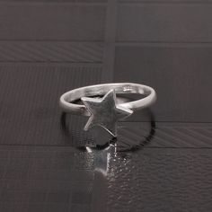 925 Sterling Silver Ring, Beautiful Star Ring, Simple Ring, Trending Ring Jewelry, Anniversary Gift For Her, Fidget Jewelry Ring Description :- Metal : 925 Sterling Silver Stamp :- 925 Stamp Weight : 1.97 Gram Approx Production Method :- Handmade with Love and Care. Anti tarnish handmade jewelry. Free of Lead, Nickel, Cadmium. Benefits of wearing silver :- Wearing silver jewelry is proved in fighting infection and preventing yourself from cold and flu, and many kinds of bacteria and viruses. Sil Sterling Silver Star-shaped Promise Ring, Sterling Silver Star Shaped Promise Ring, Sterling Silver Star-shaped Rings, Silver Star-shaped Anniversary Ring, Silver Star-shaped Stackable Rings In Sterling Silver, Sterling Silver Stackable Star Rings, Silver Star-shaped Stackable Promise Rings, Adjustable Sterling Silver Star Ring, Nickel-free Sterling Silver Star Ring