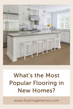 a white kitchen with the words what's the most popular flooring in new homes?