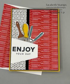 a close up of a greeting card with scissors and spoons on the front, and an envelope that says enjoy your day