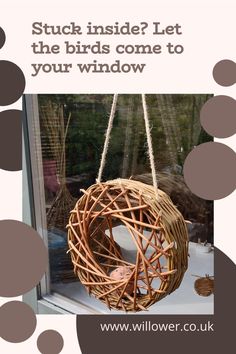 a bird feeder hanging from a window with the words stuck inside? let the birds come to your window