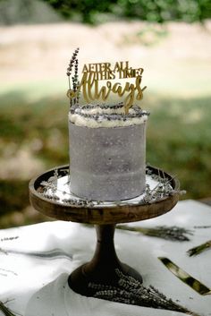 a cake sitting on top of a wooden table