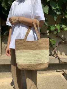 This handmade bag is crocheted from 100% natural jute. Jute is environmentally friendly material that is bio-degradable and recyclable.  The bag is durable, roomy, comfortable and natural. Sizes :  Length- 39 cm Height- 38 cm Handle drop- 24 cm Crochet Jute Bag, Jute Beach Bag, Crochet Jute, Jute Shopping Bags, Jute Tote Bag, Jute Tote Bags, Jute Totes, Jute Bag, Crochet Tote Bag