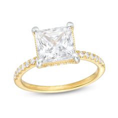 a princess cut diamond engagement ring set in yellow gold with diamonds on the band and shoulders