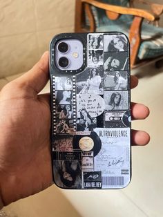 someone is holding up their phone case with pictures on it