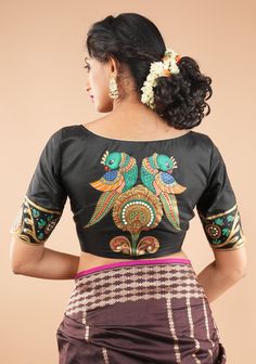 Experience the elegance of timeless Tanjore Painting styles with this handpainted pure silk Blouse. Crafted with patience and skill, this stunning blouse features a delicate depiction of parrots in the Tanjore style adding a touch of elegance and sophistication to your outfit. The base color of the blouse can be customized.  Need minor customizations such as altering the sleeve length or neckline? Or if you are looking for a custom size. Ask us and we will try our best to make it happen! SIZE GU Painting On Blouse, Whatsapp Widget, Raw Silk Blouse, House Of Blouse, Saree Painting Designs, Painting Styles, Lehenga Blouse Designs, Raw Silk Fabric, Hand Painted Sarees