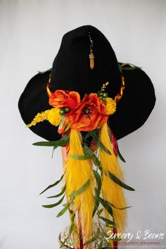 Modern wool knit witch hat beautifully decorated with florals, ribbons, beads and pendants. One-of-a-kind design that's perfect for a costume, Renaissance Faire, cosplay or your own flair! One size fits most, comfortable, breathable, soft, stretchable knit blend. Brim can be shaped as desired. Head 57cm = 22.44" Brim 5cm = 1.97" (may be small differences) All of my hats are unique and one of a kind. I really enjoy making them and creating a wearable piece of art! Whimsical Adjustable Costume Headpiece, Witchy Festival Costume Accessories, Witchy Adjustable Costume Accessories For Festival, Adjustable Fantasy Mini Hat For Costumes, Handmade Adjustable Fantasy Costume Accessories, Whimsical Adjustable Costume Accessories, Handmade Halloween Costume Hats And Headpieces For Themed Events, Handmade Adjustable Witchy Costume Hat, Adjustable Hat Bands For Halloween Costume