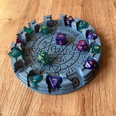 a wooden table topped with dice and numbers