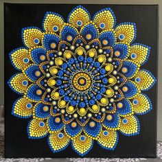 a painting of a yellow and blue flower