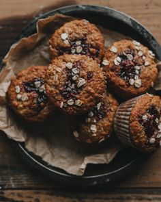 muffins with cranberries and oatmeal are on a plate