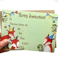 a hand holding up a card with a fox on it's back and the words, party invitation to please come to at on time rsp