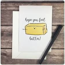 a piece of butter with the words hope you feel butter written on it next to a pen