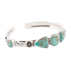 Add some stylish edge to your look with this beautiful Turquoise and Sterling Silver Cuff Bracelet. Handcrafted and finished with genuine Turquoise stones, this cuff is perfect for the fashion-forward woman. The 2.5" diameter makes it an ideal fit for most wrists, while the 5 high-polish bezels add an extra bit of shine. Make a statement with this stunning piece! Hand Cuff Bracelet, Agate Earrings, Sterling Silver Cuff Bracelet, Turquoise Stones, Genuine Turquoise, Green Gemstones, Sterling Silver Cuff, Lovely Jewellery, Silver Cuff Bracelet