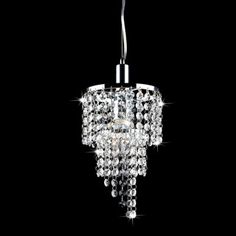 a crystal chandelier hanging from the ceiling