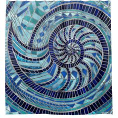 a blue and black mosaic tile design