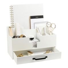 a white desk organizer with drawers and office supplies