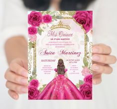 a woman holding up a pink and gold princess birthday party card with roses on it