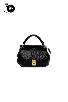 This luxurious��Miu Miu shoulder bag is crafted of vitello shine patch leather in black. The handstitched geometric patchwork paired with the gold-tone hardware makes for a chic ensemble. Store daily essentials in the��spacious black fabric interior including one zip pocket. The overall look is finished with a top handle and removable/adjustable crossbody strap for versatile use.�� This Miu Miu Vitello Shine handbag from the iconic fashion house will��be a closet staple for years to come!    Mod Gold Quilted Top Handle Bag, Modern Miu Miu Bags With Detachable Handle, Modern Miu Miu Bag With Detachable Handle, Miu Miu Evening Shoulder Bag With Top Carry Handle, Modern Miu Miu Shoulder Bag With Detachable Handle, Luxury Miu Miu Satchel Shoulder Bag, Luxury Miu Miu Bag With Detachable Strap, Luxury Miu Miu Satchel Bag, Miu Miu Formal Top Handle Shoulder Bag